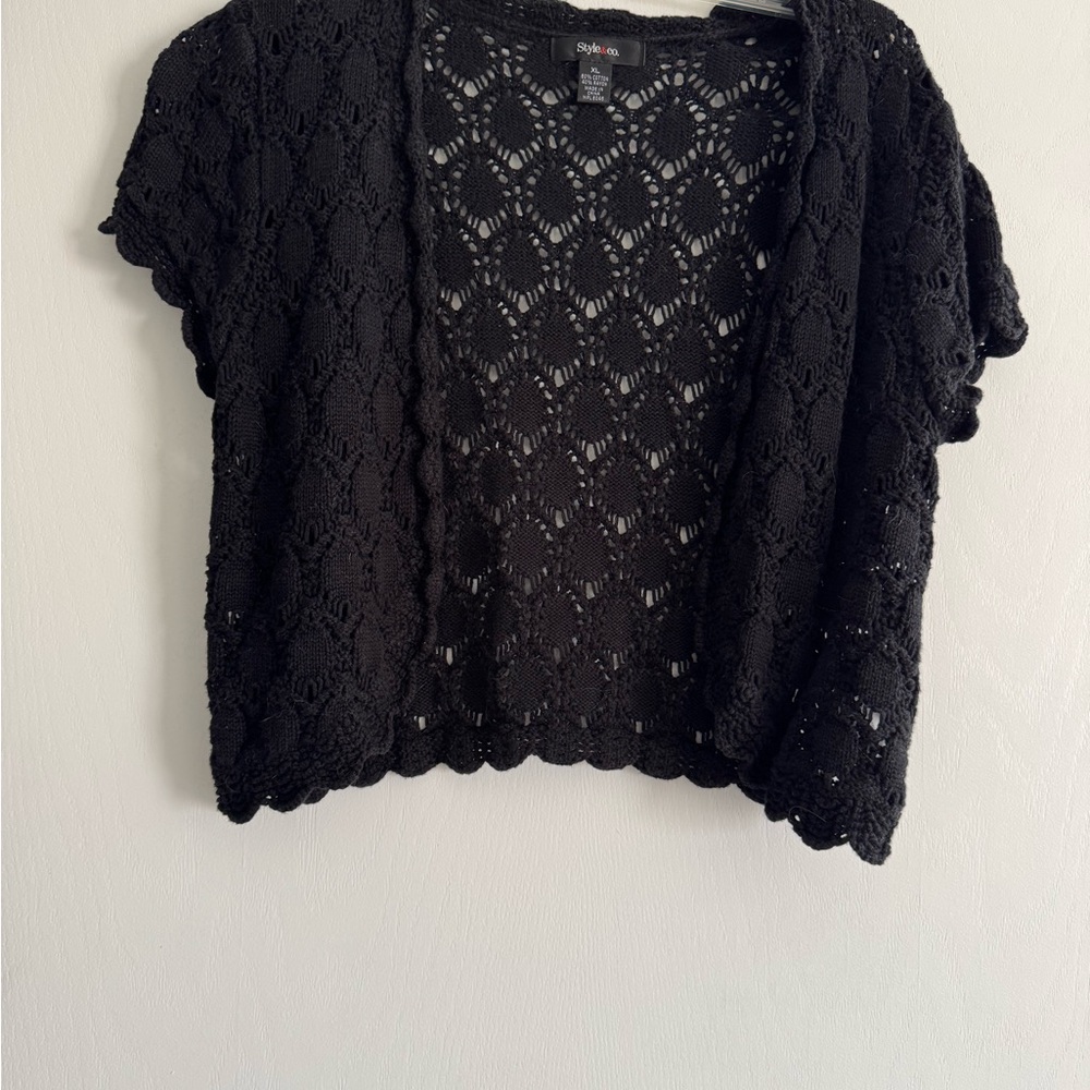 Style & Co. Black, crocheted, open front Shrug. 
60% cotton. 40% Rayon.